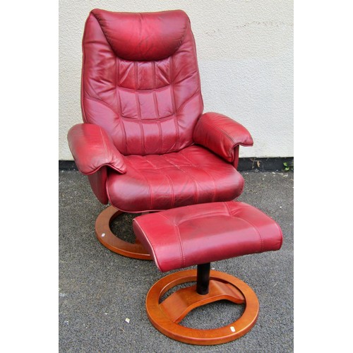 1550A - A Stressless style chair and stool in red upholstery