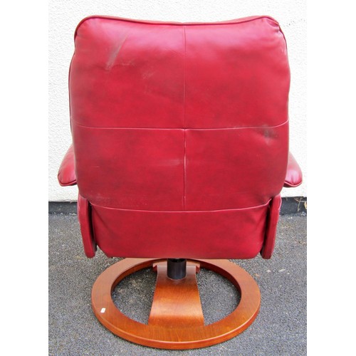 1550A - A Stressless style chair and stool in red upholstery