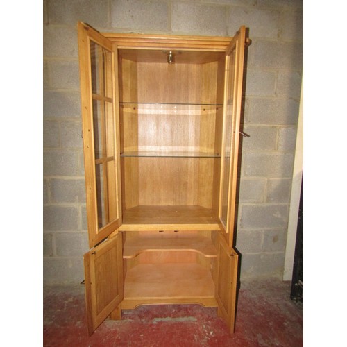 1553 - A contemporary light oak Arts & Crafts style freestanding corner or alcove cabinet, enclosed  by two... 