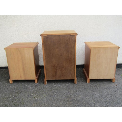 1555 - A pair of pale pine three drawer bedside chests, 67cm high, 50 x 46cm, together with a similar four ... 