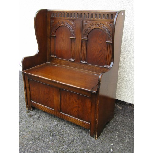 1557A - A Bevan Funnell ‘Reprodux’ reproduction oak box settle in the old English style, 103cm high, 86 x 39... 