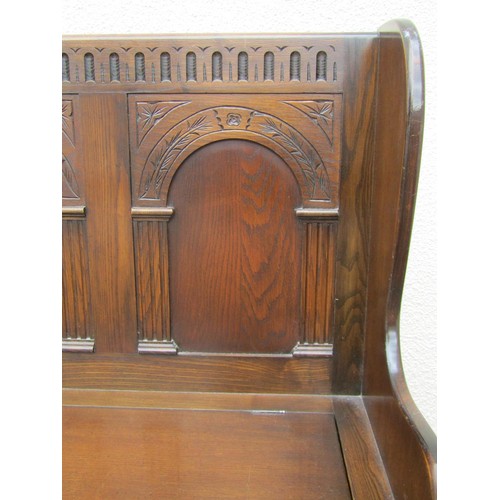 1557A - A Bevan Funnell ‘Reprodux’ reproduction oak box settle in the old English style, 103cm high, 86 x 39... 