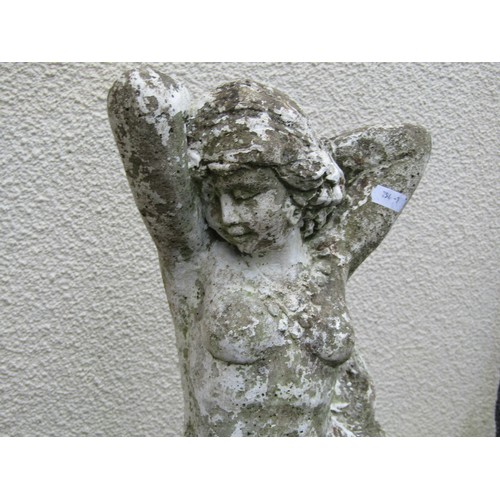 1562 - A painted and weathered cast composition stone garden statue in the form of a maiden with long flowi... 