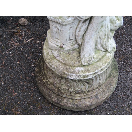 1562 - A painted and weathered cast composition stone garden statue in the form of a maiden with long flowi... 