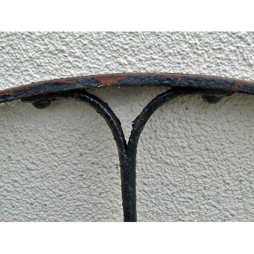 1564 - A large pair of antique wrought iron coach wheels, 135cm diameter (2)