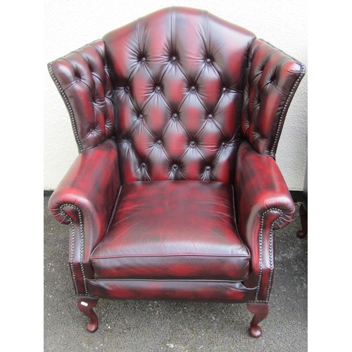 1567A - A pair of Thomas Lloyd wing elbow chairs, in the George III style (2)