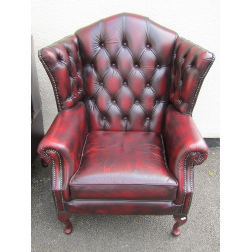 1567A - A pair of Thomas Lloyd wing elbow chairs, in the George III style (2)