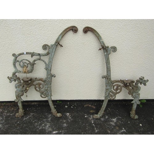 1580 - A pair of 19th century cast iron bench ends with dragon and scroll detail  91 cm (full height) (af) ... 