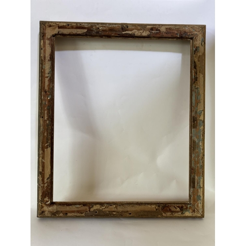 1705 - A 19th century gilt picture frame with scrolling foliate gesso corner mouldings, fitting dimensions ... 