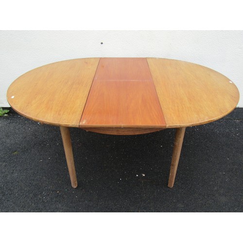 1586 - A 20th century teak D-end extending dining table, with single additional leaf, raised on squared tap... 