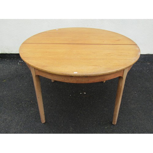 1586 - A 20th century teak D-end extending dining table, with single additional leaf, raised on squared tap... 