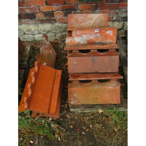 1036 - Architectural salvage - Twelve reclaimed terracotta ridge tiles with repeating pattern, together wit... 