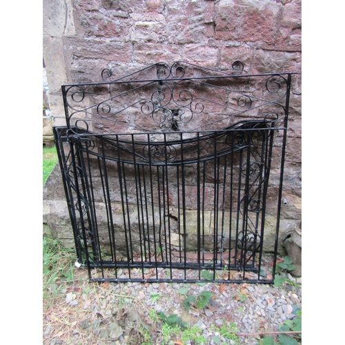 1039 - A  painted ironwork pedestrian gate with open scrollwork detail 124 cm high x 116 cm high together w... 