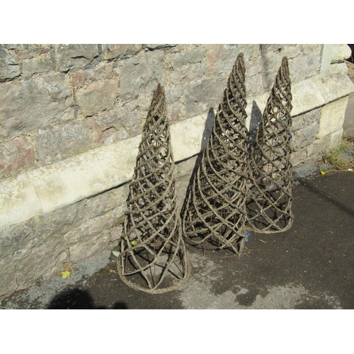 1110 - Four weathered woven wicker and iron wire work garden obelisks of pointed conical form, each 79cm hi... 