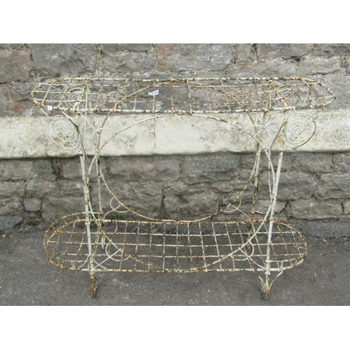 1131 - An old weathered painted two-tier wirework greenhouse/conservatory plant stand, 73cm high, 94 x 28cm... 