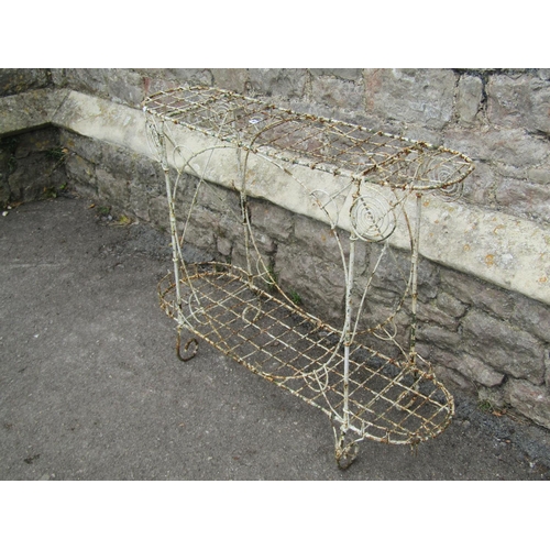 1131 - An old weathered painted two-tier wirework greenhouse/conservatory plant stand, 73cm high, 94 x 28cm... 