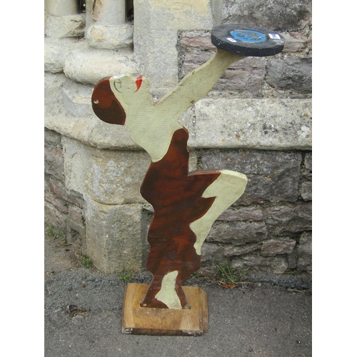 1144 - An early 20th century dummy board/jardiniere stand in the form of a stylised figure in profile, 92cm... 