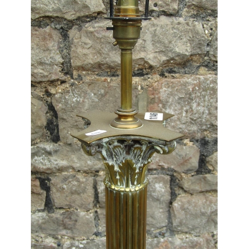 1146 - A pair of Edwardian brass standard lamps in the form of fluted columns with Corinthian capitals, rai... 