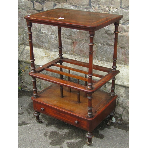 1219 - A Victorian walnut and rosewood banded Canterbury with a single drawer, a raised wotnot top, turned ... 