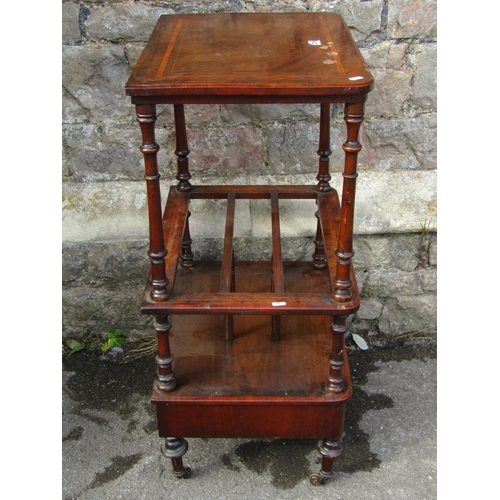 1219 - A Victorian walnut and rosewood banded Canterbury with a single drawer, a raised wotnot top, turned ... 