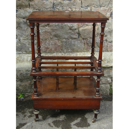 1219 - A Victorian walnut and rosewood banded Canterbury with a single drawer, a raised wotnot top, turned ... 