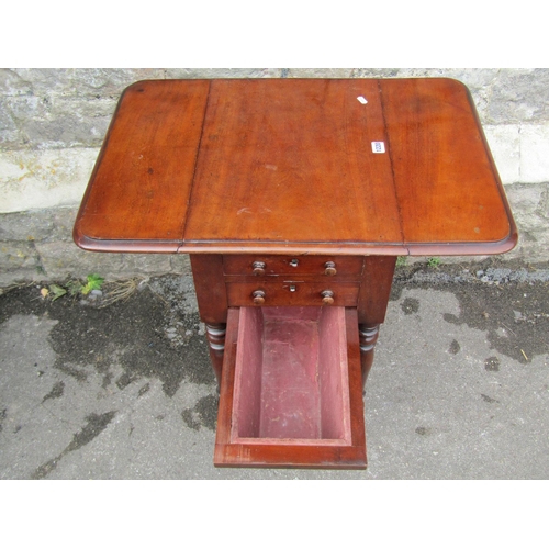 1220 - A Victorian mahogany sewing table with drop sides over two drawers and two false drawers, slide out ... 