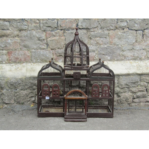 1322 - A large, decorative Moroccan built antique birdcage of architectural form, in the form of a grand pa... 