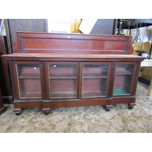 1348 - A large freestanding Victorian enclosed mahogany breakfront bookcase, with gallery back over glazed ... 