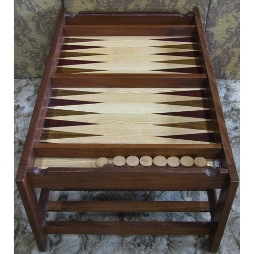 1225 - A good quality contemporary teak and inlaid games table with sliding compartmental top revealing a c... 