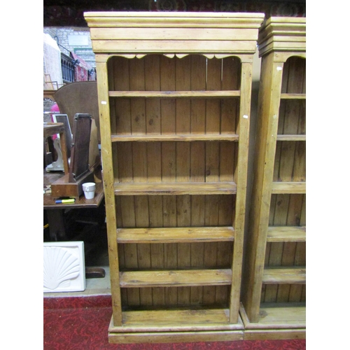 1152 - A matched pair of free-standing rustic pale pine bookcases, each 191cm high, 91 x 26cm