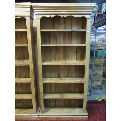 1152 - A matched pair of free-standing rustic pale pine bookcases, each 191cm high, 91 x 26cm