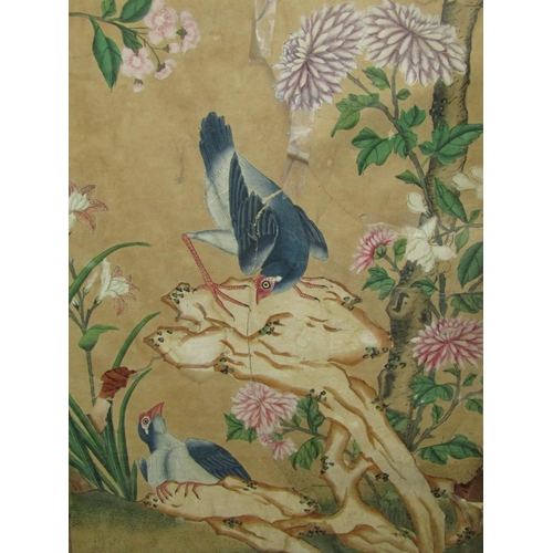 1400 - A decorative Chinese three panel room devising screen, decorated with birds and fowl amongst blossom... 