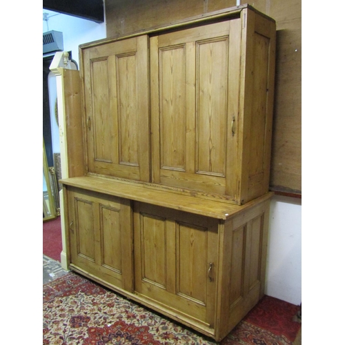 1430 - A large late Victorian rustic farmhouse pine housekeeper’s cupboard, with sliding doors opening to r... 