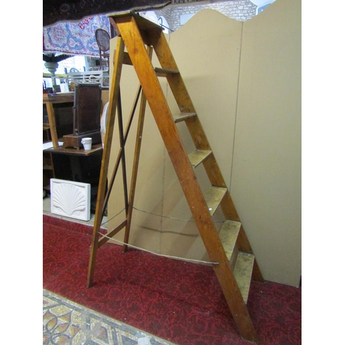 1433 - A vintage pine and ply folding step ladder, 191cm high.