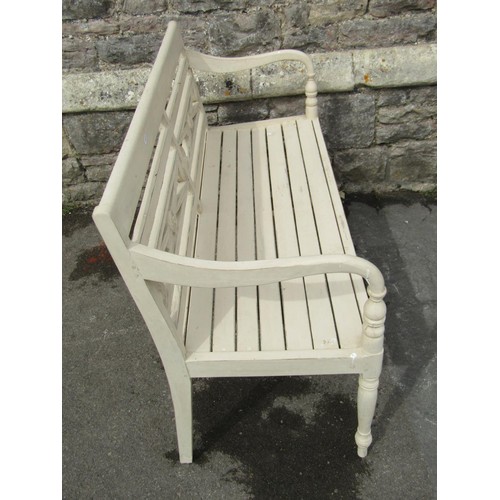 1238 - A painted garden bench with slatted seat and carved panelled back, 48cm seat height, 119cm wide.