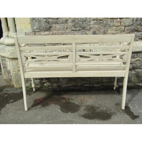 1238 - A painted garden bench with slatted seat and carved panelled back, 48cm seat height, 119cm wide.