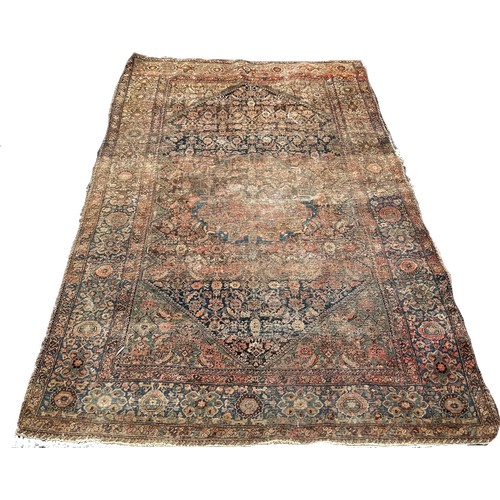 1746 - Six old worn and torn Middle Eastern carpets of varying designs sizes and condition all as found