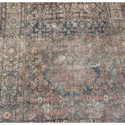 1746 - Six old worn and torn Middle Eastern carpets of varying designs sizes and condition all as found