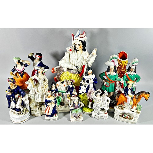 69 - A collection of Staffordshire figures