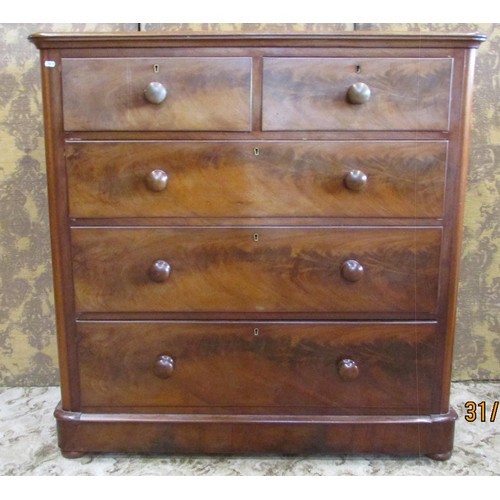 1318 - A late 19th century mahogany chest of two short and three graduating long drawers, with turned handl... 