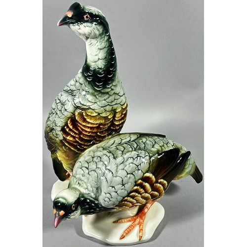 90 - A German porcelain partridge group by Karl Ens