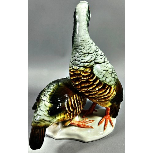 90 - A German porcelain partridge group by Karl Ens