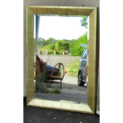 1588 - A large square contemporary gilt framed wall mirror, enclosing a bevelled plate 90 x 120cm.