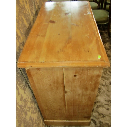 1196 - A stripped pine chest of drawers with two short over three long graduated drawers, 100cm w x 93cm h ... 