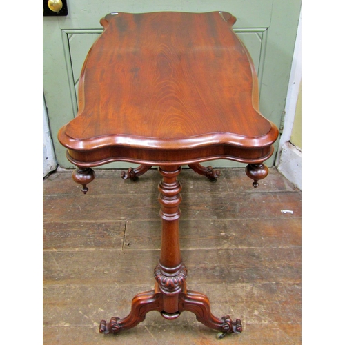 1505 - 19th century mahogany centre table, the shaped outline raised on a stretcher base with scrolled term... 