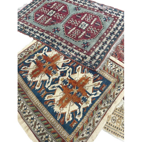 1745 - Six old worn and torn Middle Eastern carpets of varying designs, sizes and condition, all as found