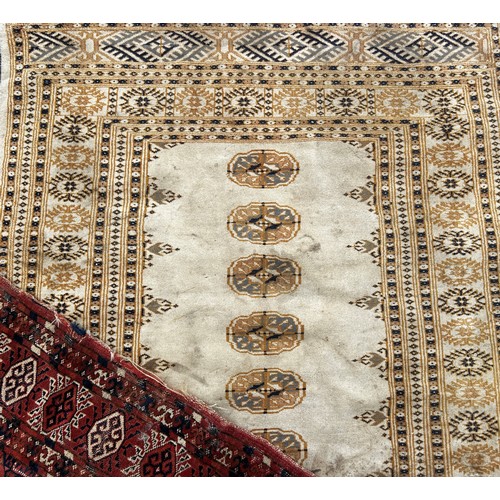 1745 - Six old worn and torn Middle Eastern carpets of varying designs, sizes and condition, all as found