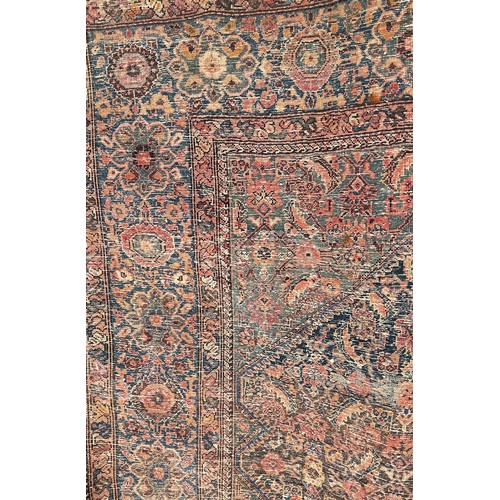 1745 - Six old worn and torn Middle Eastern carpets of varying designs, sizes and condition, all as found