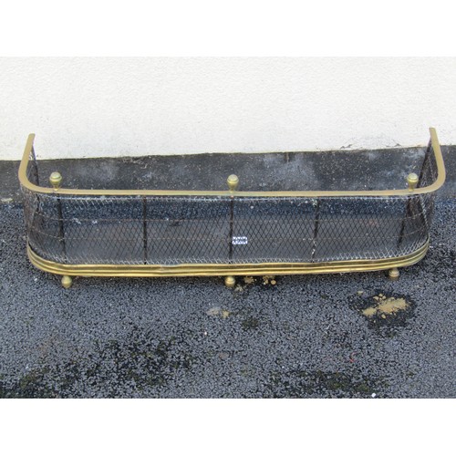 1595 - A small wire work brass framed Regency fireside fender, 83cm wide.