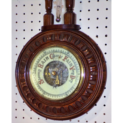 404 - A barometer with painted porcelain dial